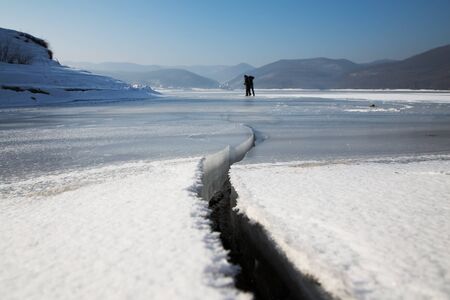Cincis lake , Frozen lake and cracked in winterの写真素材