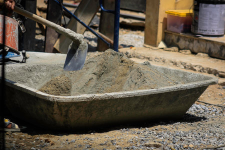 Mixing concrete with sandの写真素材