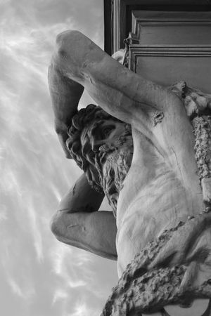 Statue of atlant hold the skyの写真素材