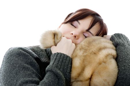 Adult girl is hugging big soft toy