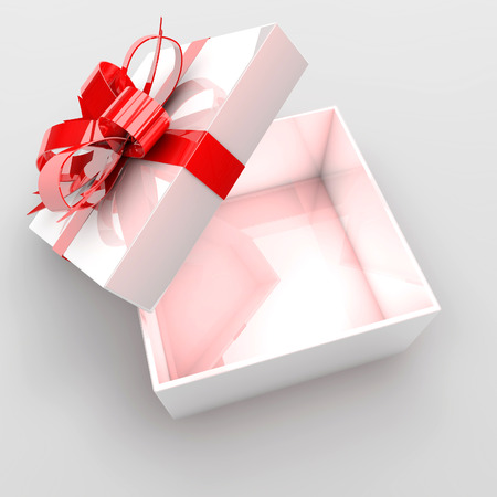 Open gift box with red bow.の写真素材