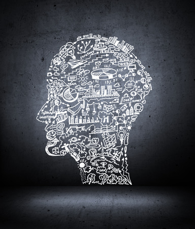 Business drawing in shape of man headの写真素材