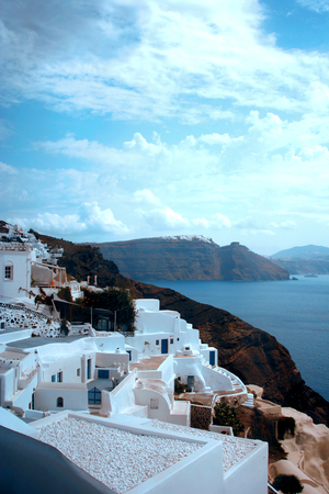 Santorini island, Greece. Oia, Fira town. Traditional and famous houses and churches over the Caldera, Aegean seaの写真素材