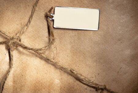 Empty label against a packing paperの写真素材