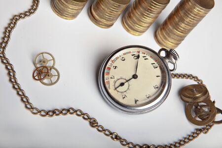Pocket watch, coins, clockwork detailsの写真素材