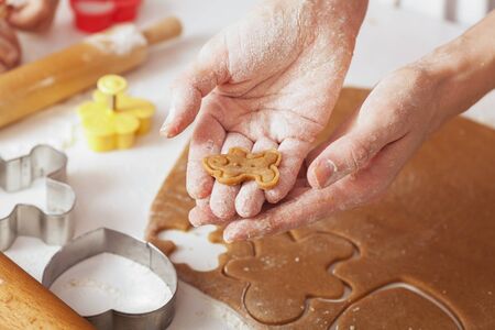 cookie dough in the hands of the bakerの写真素材