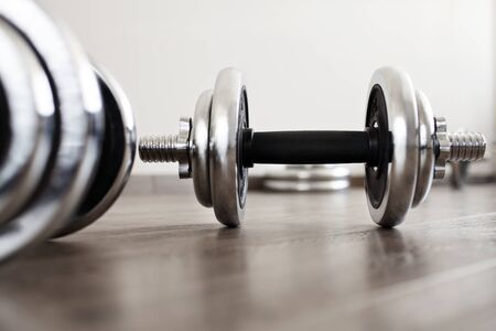 dumbbells in empty roomの写真素材