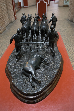 Sculpture of a dead bull being dragged in Seville, Spain, Europeの写真素材