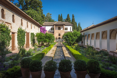 View of The Generalife courtyard, with its famous fountain and garden Alhambra de Granada complex at Granada, Spain, Europe on a bright summer dayのeditorial素材