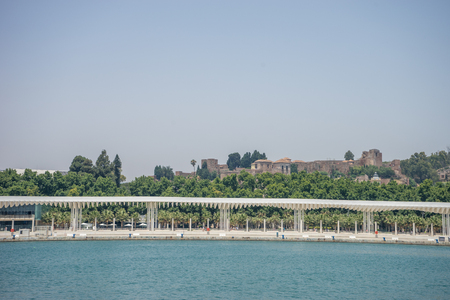 Castle overlooking the sea at Malaga, Spain, Europe on a summer day with clear blue skiesのeditorial素材