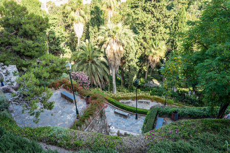Gardens on the hill overlooking the city of Malaga, Spain, Europe on a bright summer dayの写真素材