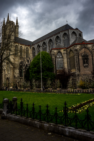 A view of the Saint Nicholas Church, Ghent, Belgium on a bright summer day with blue skyの写真素材