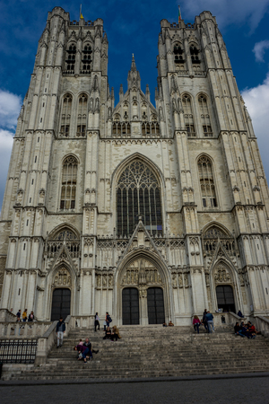 Brussels, Belgium - April 14, 2017 :  The Cathedral of St. Michael and St. Gudula at Brussels, Belgium, Europe on april 14, 2017. People are walking from the church after finishing their prayers on April 14 in Belgiumのeditorial素材
