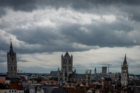 The skyline of Ghent viewed on a cloudy day in Belgium, Europeの写真素材