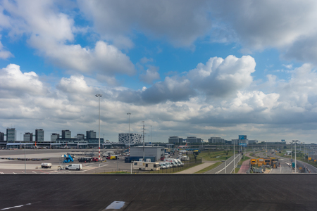 Schiphol,Netherlands - June 25, 2017 :  the airport viewed from the aeroplane window during taxi after landing at Schipholのeditorial素材