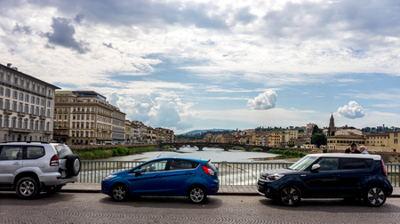 Florence, Italy - 25 June 2018:Traffic on a bridge over the Arno river at Florence, Italyのeditorial素材