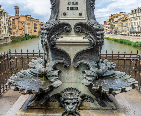Florence, Italy - 25 June 2018: Monument to Benvenuto Cellini by Raffaello Romanelli, Ponte Vecchio, Florenceのeditorial素材