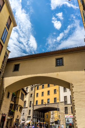 Florence, Italy - 25 June 2018: The arch at the entrance of Ponte Vecchio over the Arno River in Florence, Italyのeditorial素材