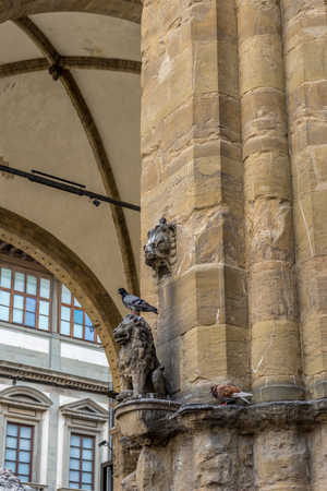 Florence, Italy - 25 June 2018:  Piazza della Signoria with the Uffizi Lion at Loggia dei Lanzi in Florence, Italyのeditorial素材