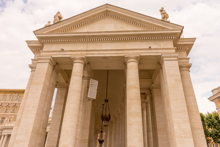 Vatican City, Italy - 23 June 2018: Facade of the Saint Peter's Basilica at St. Peter's Square in Vatican City viewed through an archのeditorial素材