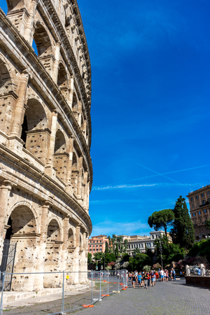 Rome, Italy - 24 June 2018: People at the entrance of the Roman Forum and the Great Roman Colosseum (Coliseum, Colosseo), also known as the Flavian Amphitheatreのeditorial素材