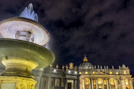 Vatican City,Italy - 23 June 2018: The water fountain is lit up at St.Peters square in Vatican city at nightのeditorial素材