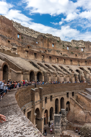 Rome, Italy - 23 June 2018: Interior of the Roman Colosseum (Coliseum, Colosseo), also known as the Flavian Amphitheatre. Famous world landmark. Scenic urban landscape.のeditorial素材