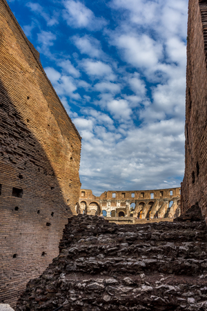 Rome, Italy - 23 June 2018: Interior of the Roman Colosseum (Coliseum, Colosseo), also known as the Flavian Amphitheatre. Famous world landmark. Scenic urban landscape.のeditorial素材