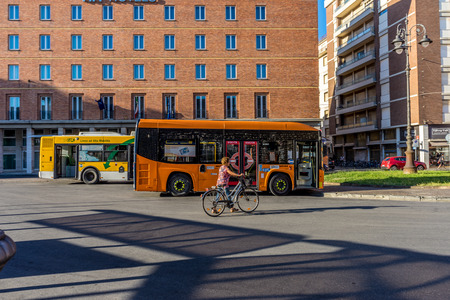 Pisa, Italy - 25 June 2018: Orange local transport bus in Pisa, Italyのeditorial素材