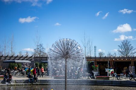 Flower garden, Netherlands, Europe, a group of people standing in front of a buildingの写真素材