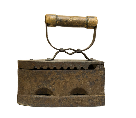 Rusty coal iron. Isolated on white backgroundの写真素材