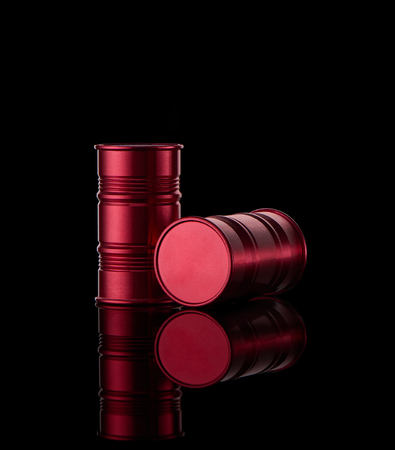 Two glossy barrels isolated on black background. Redの写真素材