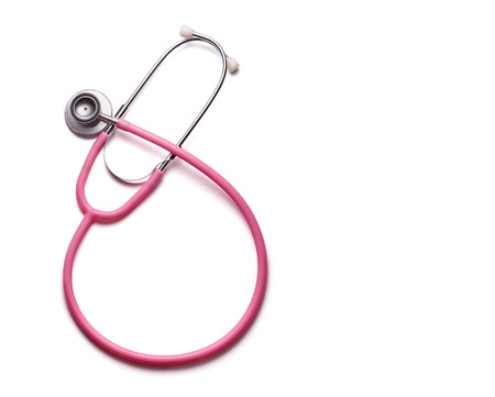 Pink stethoscope isolated on white background. Copy spaceの写真素材