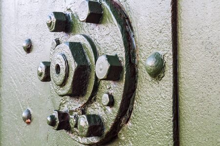 Bolts and nuts on military tank, cloe up viewの写真素材