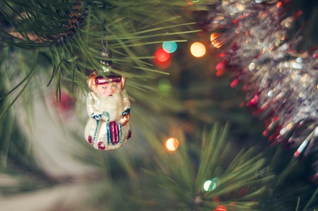 Closeup of Christmas ball from Christmas tree with colored lights.の写真素材
