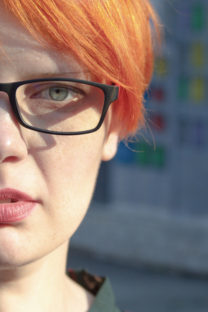 Smiling pretty young woman with short hairの写真素材