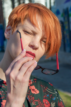 Smiling pretty young woman with short hairの写真素材