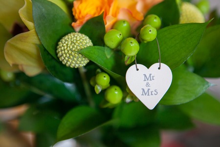 Selective focus shot of beautiful wedding bouquet on the background of the seaの写真素材