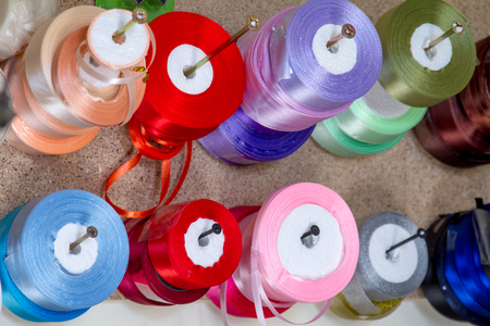 haberdashery haberdasher ribbon reels rolls rows and trims in fabric retail shop sew sewing supplies for sale retail shop marketの写真素材