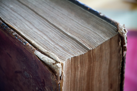 400 year old antique book. Has that beautiful patina that only centuries can create. Selective focus, free text space.の写真素材