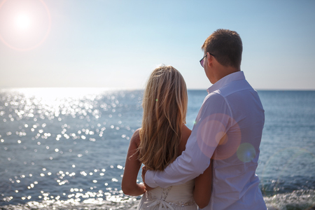 Greece, Santorini, Oia. September 17, 2014: a couple of newly married people enjoying their honeymoon months in Greece in the pool or by the seaのeditorial素材