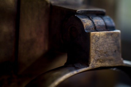 Closeup of a wooden handle on an antique brass samovar. Selective focusの写真素材