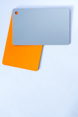 Concept of color cards on white background two colors gray and orange isolate on white background.の写真素材