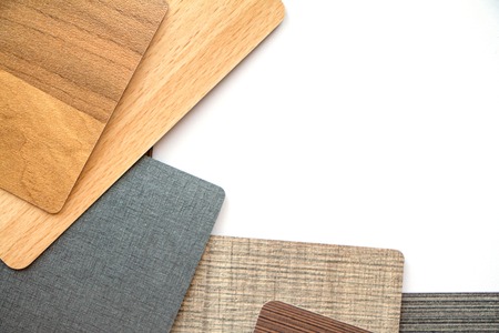 Background or concept of multi-colored cards in gray and brown tones and different textures isolate on a white backgroundの写真素材