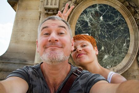 Paris, France - July 06, 2018: Selfie men and women on the background of the Place de la Concorde in Parisのeditorial素材