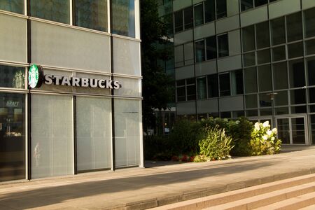 Paris, France - July 10, 2018: Starbucks signboard on an office building in the business district of Paris la Defenseのeditorial素材