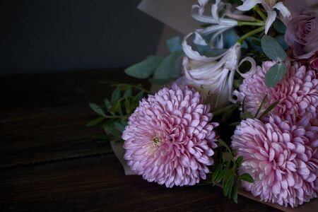 Bouquet detail close up decorated in vintage style on a dark background, selective focusの写真素材