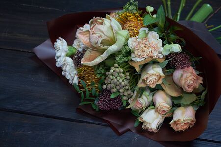 Top view bouquet in pastel colors in vintage style on dark background, selective focusの写真素材