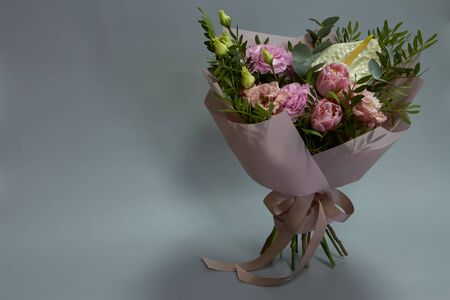 Beautiful bridal bouquet in vintage style, gray background, selective focusの写真素材