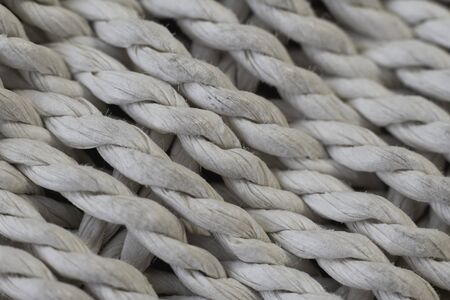 Natural background, extremely closeup surface of woven threads, selective focus